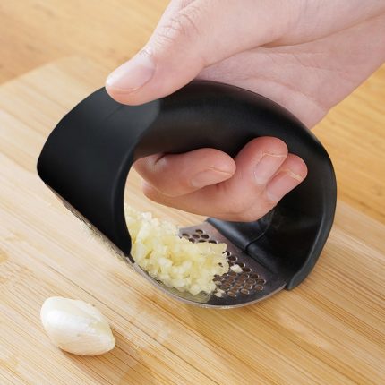 Garlic presser