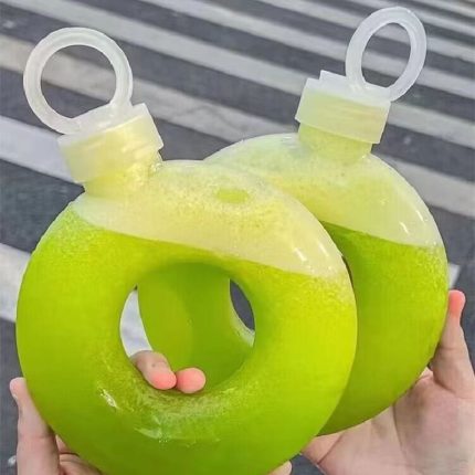 Round juice bottle with strap